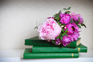Wedding bouquet of a pink  peonies, tulips and lily of the valley