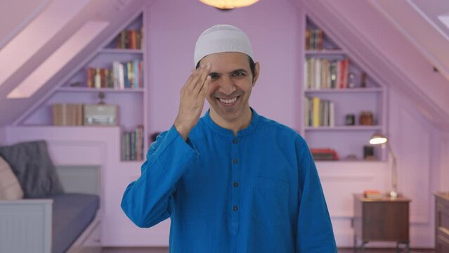 Happy Muslim man doing Adaab and greetings