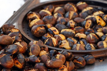 Perfect Snack Roasted Chestnuts. Street Food. Selective Focus. High quality Photography
