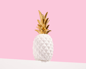 Decorative expensive luxury pineapple. A gift for an elegant interior.