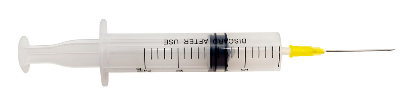 Medical syringe with a needle on a white background close-up. Syringe isolate