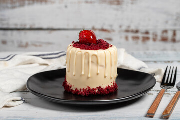 Fruitcake. Raspberry and strawberry cake on a white background