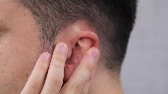 man ear pain