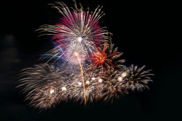 colourful firework display set for celebration happy new year and merry christmas and  fireworks on black background