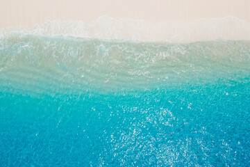 White sand beach with tropical sea. Aerial view of holidays beach on tropical islands - obrazy, fototapety, plakaty