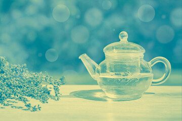 Fresh delicious tea with lavender and beautiful flowers on white marble table. duotone