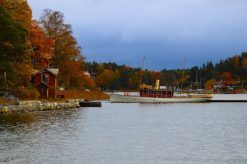 swedish houses next to the water