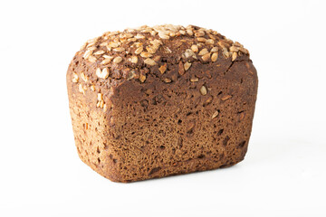 Grain black bread with sunflower seeds. A healthy breakfast.