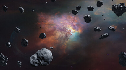 Asteroids in outer space on nebula background with starlight. Elements of this image furnished by...