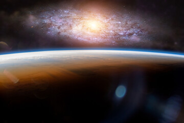 Planet Earth with stars and galaxies. Elements of this image furnished by NASA.