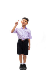 Excited wow finger point up and side. Thai school uniform. Portrait Young Asian cute boy standing on white studio background banner. Back to school.
