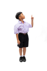 Excited wow finger point up and side. Thai school uniform. Portrait Young Asian cute boy standing on white studio background banner. Back to school.
