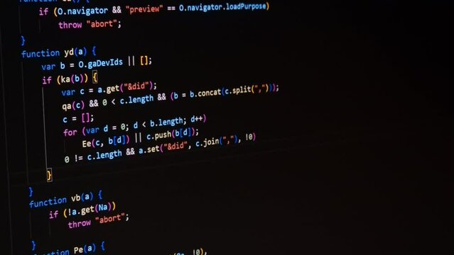 Code. Colorful jsx javascript computer programming code scroll close up pixel detail shot 4K super macro on screen.