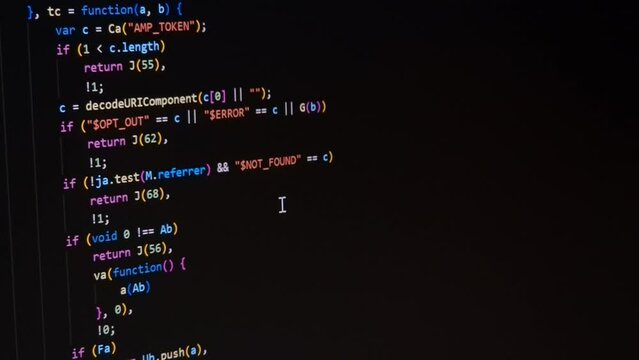 Code. Colorful jsx javascript computer programming code scroll close up pixel detail shot 4K super macro on screen.