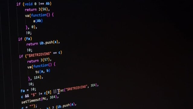 Code. Colorful jsx javascript computer programming code scroll close up pixel detail shot 4K super macro on screen.