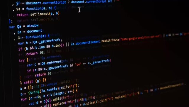 Code. Colorful jsx javascript computer programming code scroll close up pixel detail shot 4K super macro on screen.