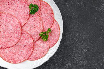 sausage salami fresh meat appetizer meal food snack on the table copy space food background rustic...