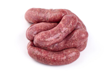 German Oktoberfest Sausages with basil leaf, close-up, isolated on white background.