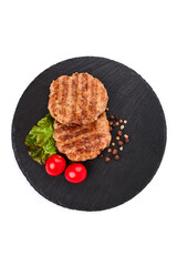 Fried pork burger cutlets, isolated on white background.