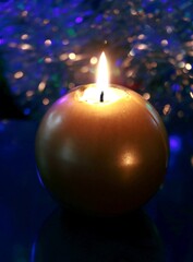 burning candle and christmas tree 