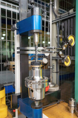 A stand for checking cutters and cutting tools for runout in the centers using indicators.