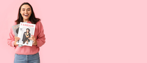Beautiful young woman with magazines on pink background with space for text