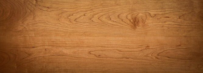 wood texture background. Cherry wood tabletop texture. Wooden plank texture. Long wooden desktop...