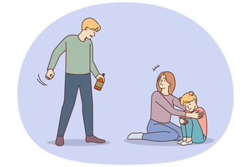 Scared mother protect child from drunk father