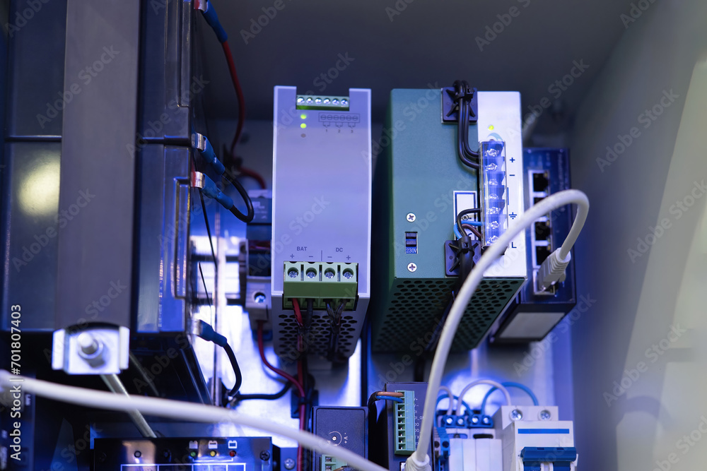 Poster equipment for industrial automation. production computer. network hardware. router with cable for in