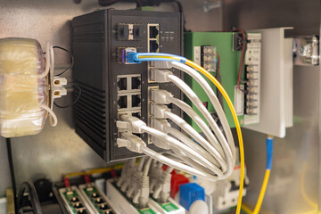 Industrial internet equipment. Network switch in steel cabinet. Low-current system. Internet...