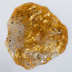 Gold color piece of slice