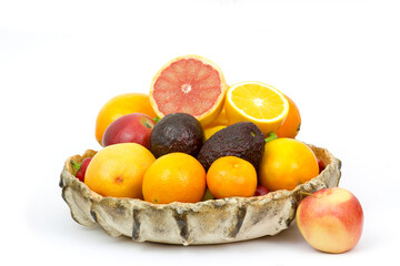 fresh fruits and vegetables in a bowl