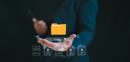 Document management system concept, business man holding folder and document icon software,...