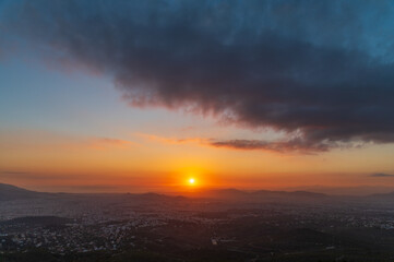 Fototapeta premium Clouds at sunset over Athens, Greece
