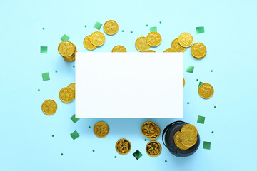 Blank card with golden coins, pot and sequins on blue background. St. Patrick's Day celebration