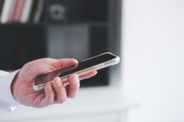 Social media marketing communication concept. hand using smartphone typing, chatting conversation or shopping online