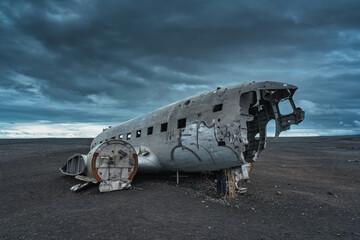 Crashed military DC 3 plane wreck on black sand beach in Iceland