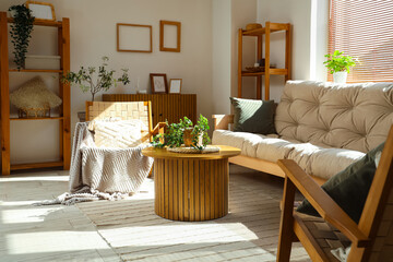 Interior of living room with sofa and armchair