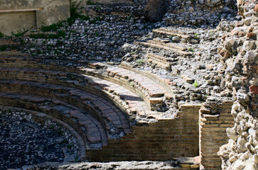 Detailed view of ruins of ancient roman Odeon theater in Taormina. Travel and tourism concept