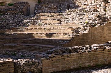 Detailed view of ruins of ancient roman Odeon theater in Taormina. Travel and tourism concept