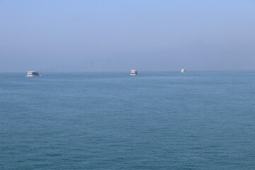 Obraz premium A fleet of Ships sets sail from Teknaf JT, bound for the stunning coral paradise of St. Martin Island, Bangladesh