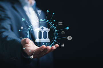 Online banking concept. Businessman holding online banking digital technology, payment for shopping and digital technology business, Finance and banking network.
