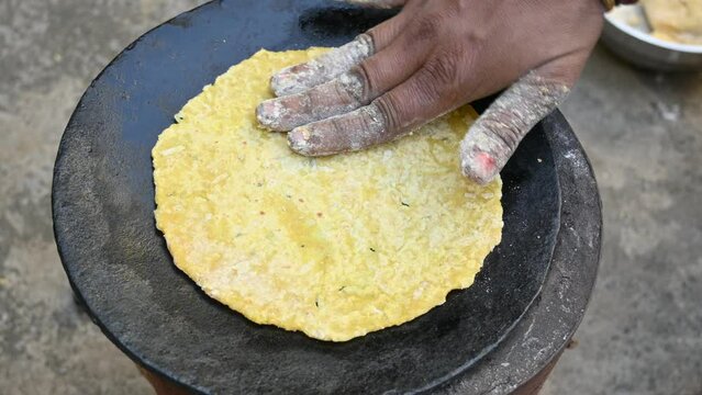 Making Mooli paratha or Radish flatbread. Healthy Indian Mooli paratha. Daikon flatbread. It is a popular food of india. It can be eaten for breakfast, lunch and dinner. Indian food. 