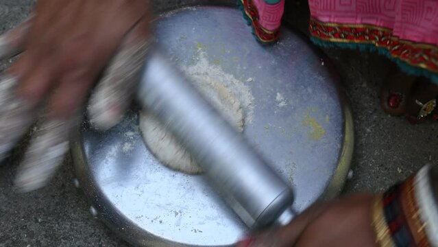 Making Mooli paratha or Radish flatbread. Healthy Indian Mooli paratha. Daikon flatbread. It is a popular food of india. It can be eaten for breakfast, lunch and dinner. Indian food. 