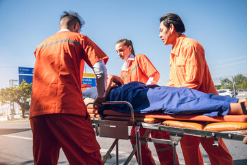 First Aid Training, Emergency Rescue Team Holding Transfer Stretcher to Help Patient in Emergency...