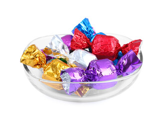 Bowl with many tasty candies in colorful wrappers isolated on white