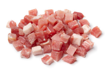 Heap of smoked bacon cubes isolated on white background close up
