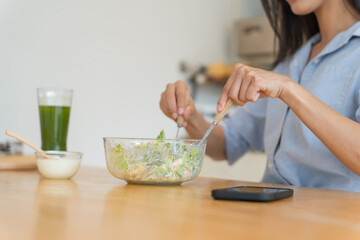 Asian woman dieting Weight loss eating fresh fresh homemade salad healthy eating concept