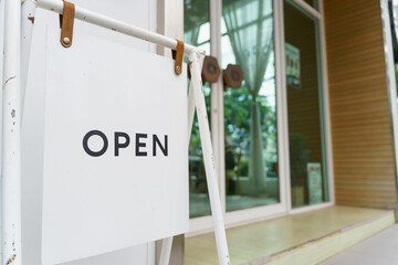 Open sign board. Board or start of opening Welcome entrance of Small business cafe or restaurant and advertising with open sign