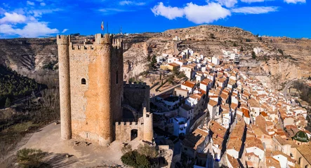 Poster Spain, Alcala de Jucar - scenic medieval village located in the rocks. Aerial drone high angle view with the castle . Castilla-la Mancha province © Freesurf